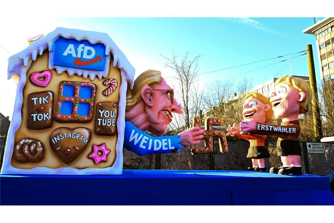 Karnevalszüge: Weidel mit Hakenkreuz und Trump unten ohne AfD-Chefin Alice Weidel lockt in Düsseldorf Erstwähler ins Hexenhaus.
