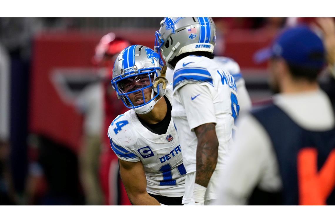 NFL: Siebter Touchdown für St. Brown bei Lions-Sieg Amon-Ra St. Brown (l.) erzielte seinen siebten Touchdown der Saison.