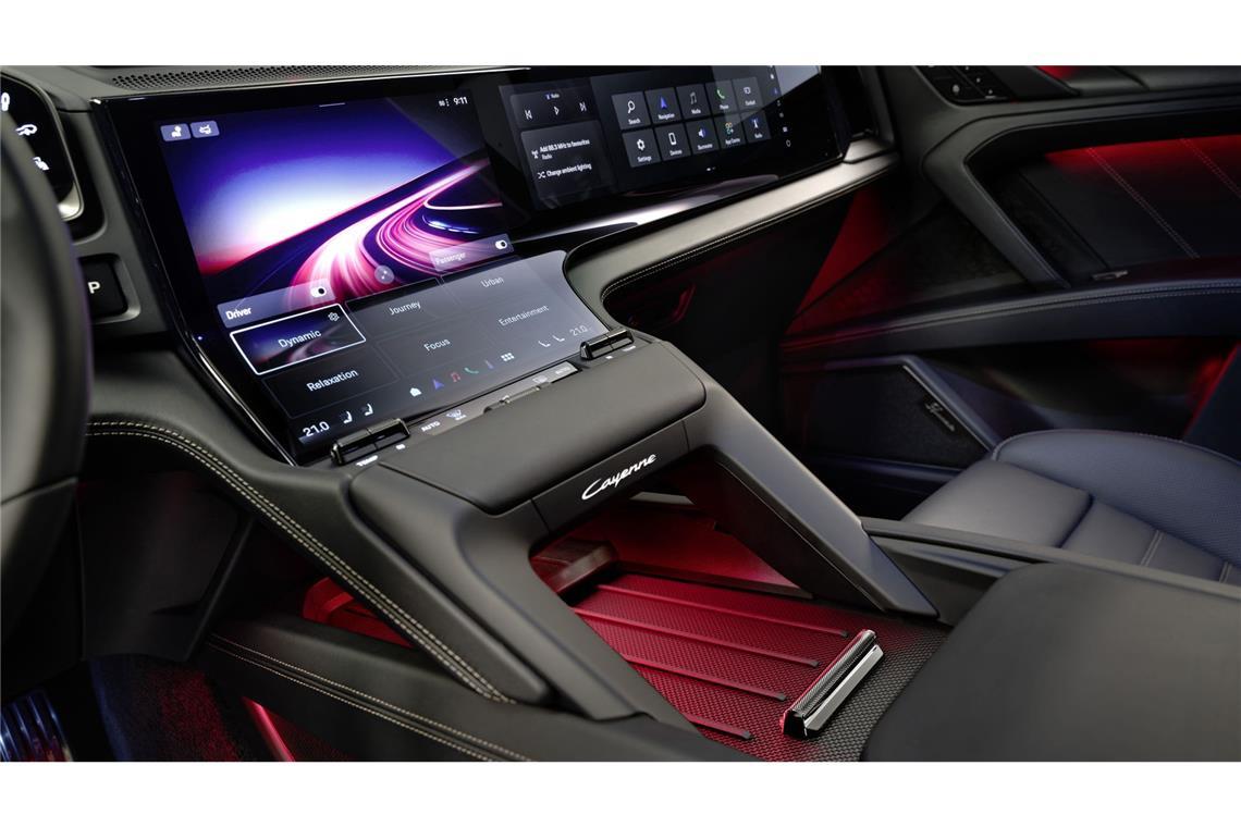 Angenehm: Trotz Touch-Bedienung verzichtet Porsche beim neuen Cayenne nicht auf Tasten: Zwischen Ferry-Pad und Screen  sind Hebel für Temperatureinstellung und Intensität sowie eine Rolle für die Lautstärke.