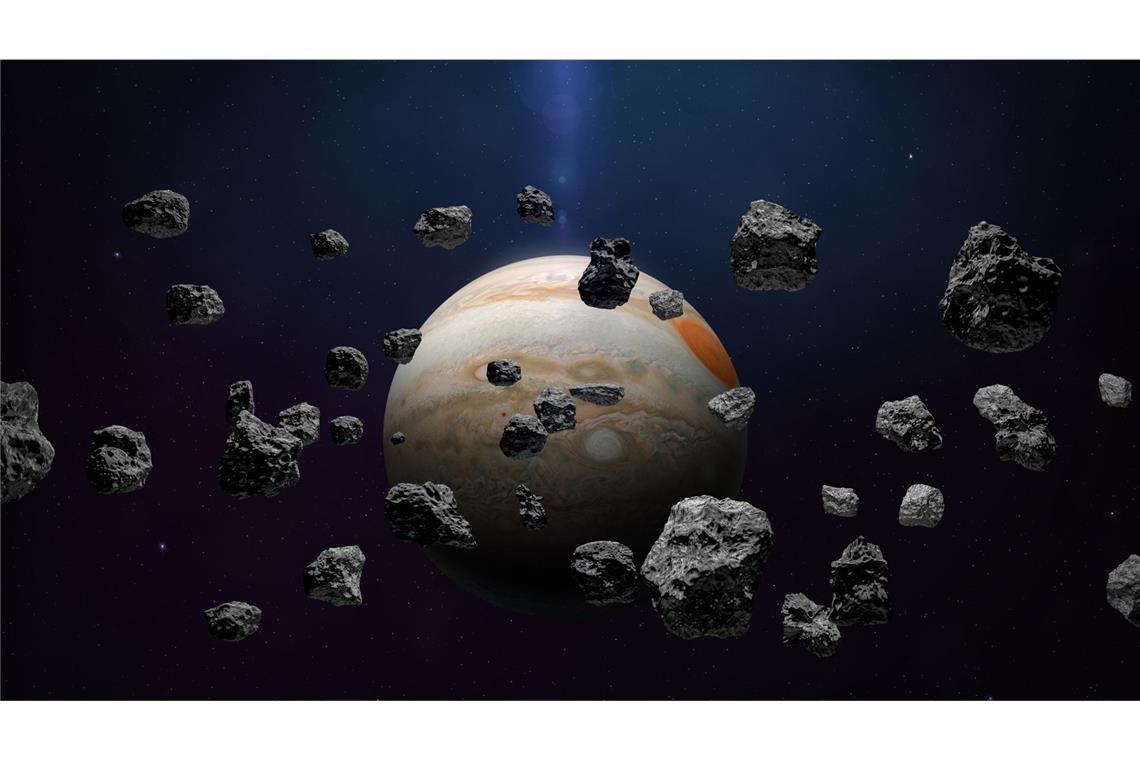 Forscher entdecken kleinste bekannte Asteroiden Asteroidenschwarm mit dem Jupiter im Hintergrund.