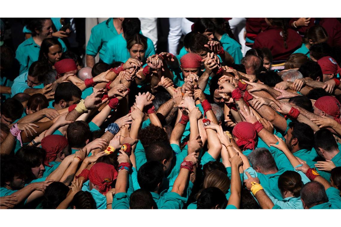 Bilder des Tages Auftritt der "colles de castellers" (Menschenpyramiden-Gruppe) während des traditionellen Festes von La Merce in Barcelona.