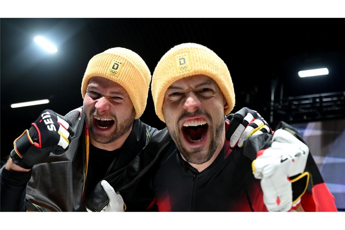 Bobpilot Johannes Lochner (li.) ist zusammen mit Anschieber Georg Fleischhauer erstmals Olympiasieger.