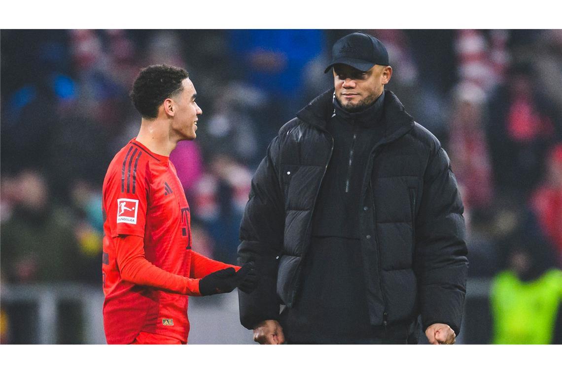 In Rotterdam geht's für die Bayern auch um Leverkusen Bringt Trainer Vincent Kompany (r) Jungstar Jamal Musiala in Rotterdam wieder von Anfang an?