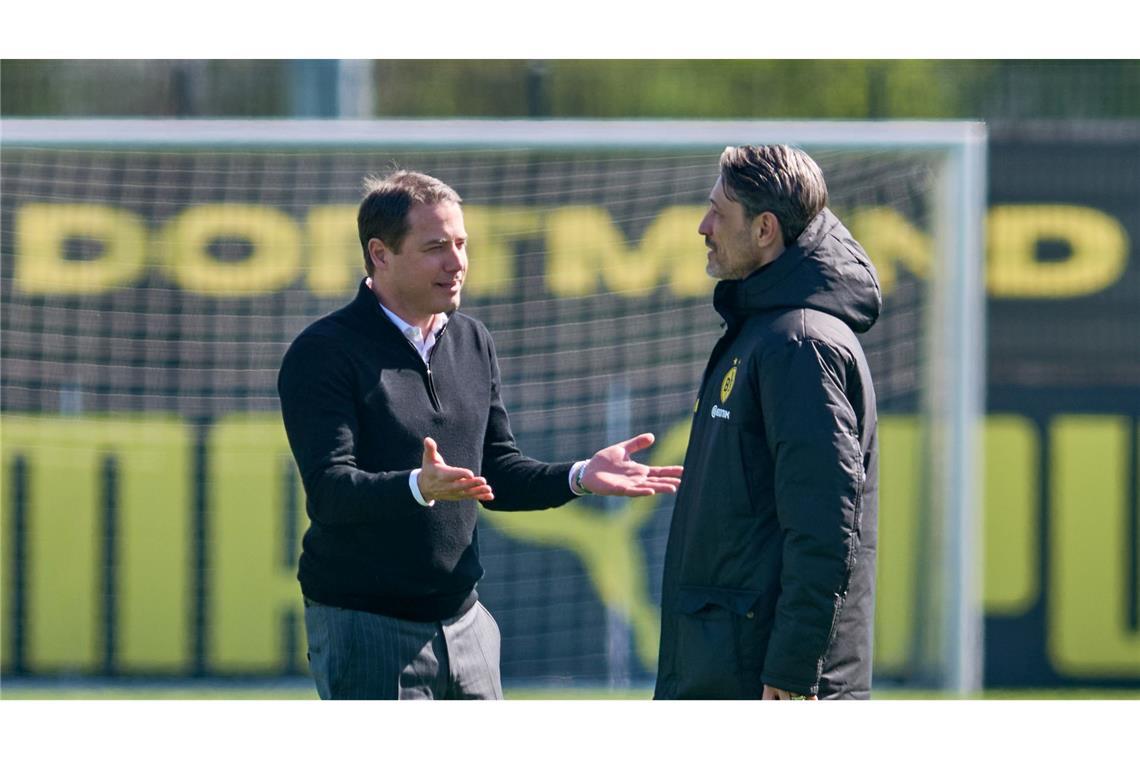 BVB trotzt Rückschlägen vor Barça: "Das wird schon" BVB-Boss Lars Ricken (links) und Trainer Niko Kovac grübeln vor der Reise nach Barcelona.