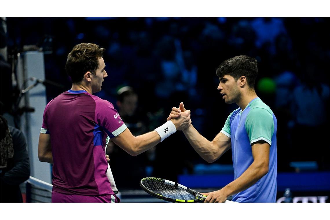 Gelingt Zverev der zweite Sieg beim Saisonfinale? Casper Ruud (l) besiegte in Turin den angeschlagenen Carlos Alcaraz.