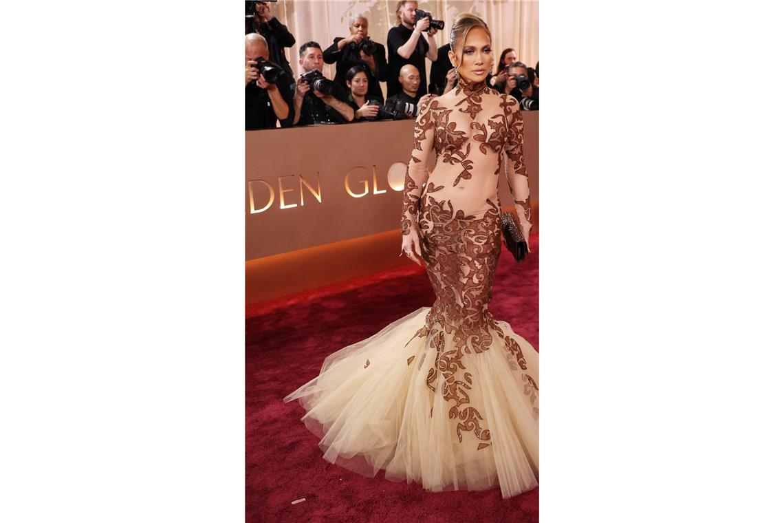 Da blitzte der Bauchnabel: Auch Jennifer Lopez setzte auf Transparenz. Das Meerjungfrauen-Kleid von Jean-Louis Scherrer mit Tüllexplosion brachte ihr aber nicht die besten Modenoten ein.