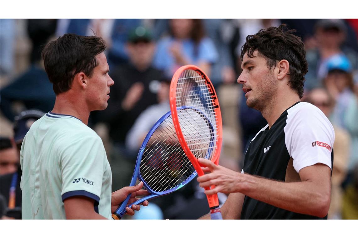 Daniel Altmaier gelingt große Überraschung Daniel Altmaier (links) besiegte überraschend den Favoriten, US-Profi Taylor Fritz.