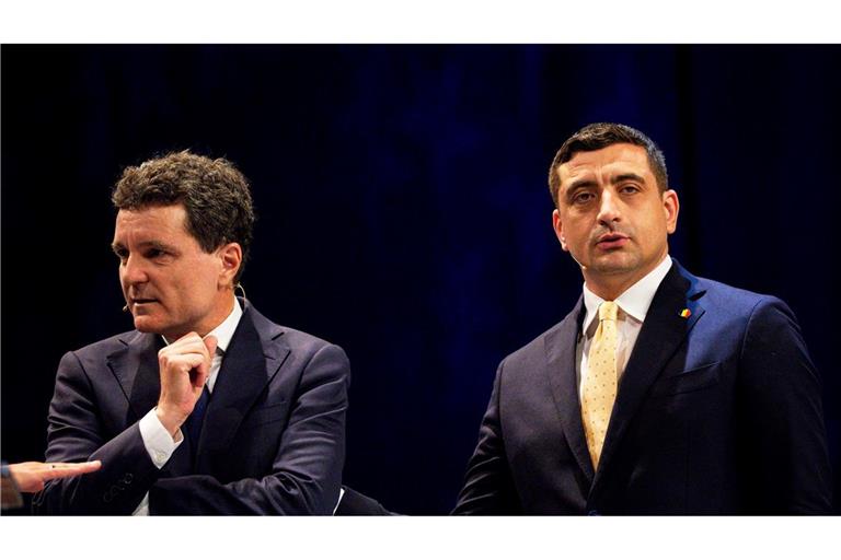 Der liberalkonservative Pro-Europäer Nicusor Dan (l) tritt bei der Präsidenten-Stichwahl in Rumänien gegen den EU-skeptischen Rechtspopulisten George Simion an. (Archivbild)