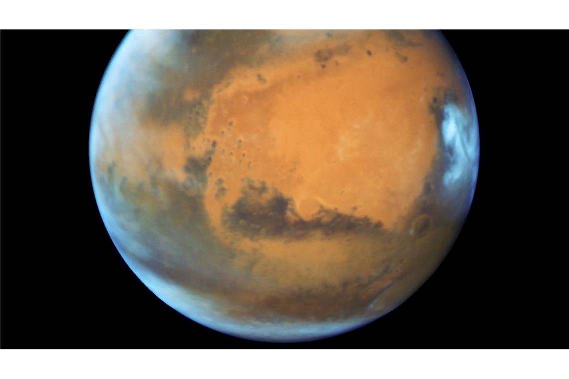 Rostiger Planet: Woher der Mars seinen Rot-Ton hat Der rötliche Planet Mars, wie er auf einem Bild des "Hubble"-Weltraumteleskops zu sehen ist. (Archivbild)