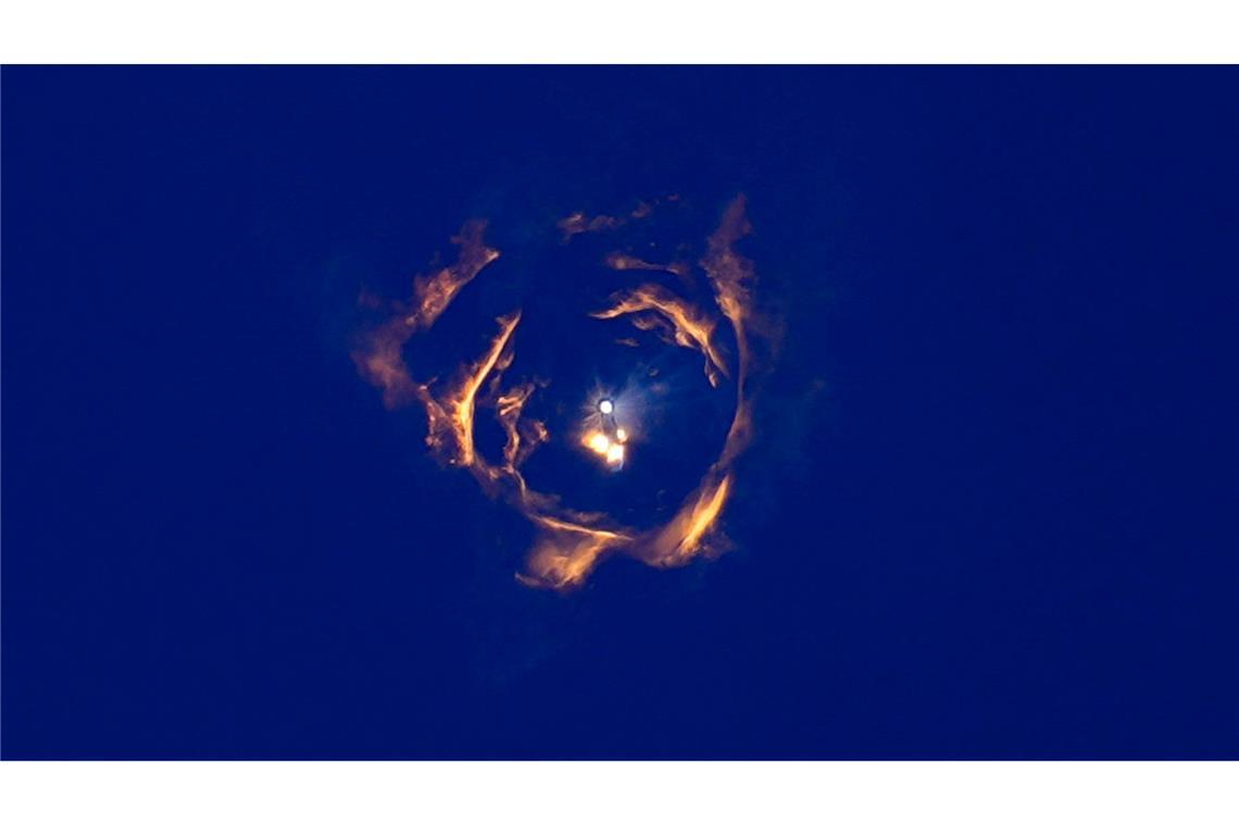 Rückschlag für Elon Musk bei siebtem Testflug von "Starship" Die Rakete Starship von SpaceX und der Booster trennen sich während eines Testflugs.