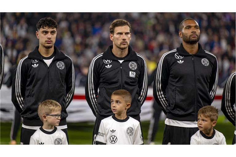 Drei Bayern-Profis, die der Nationalmannschaft Stabilität verleihen sollen: Aleksandar Pavlovic, Leon Goretzka und Jonathan Tah (von links)