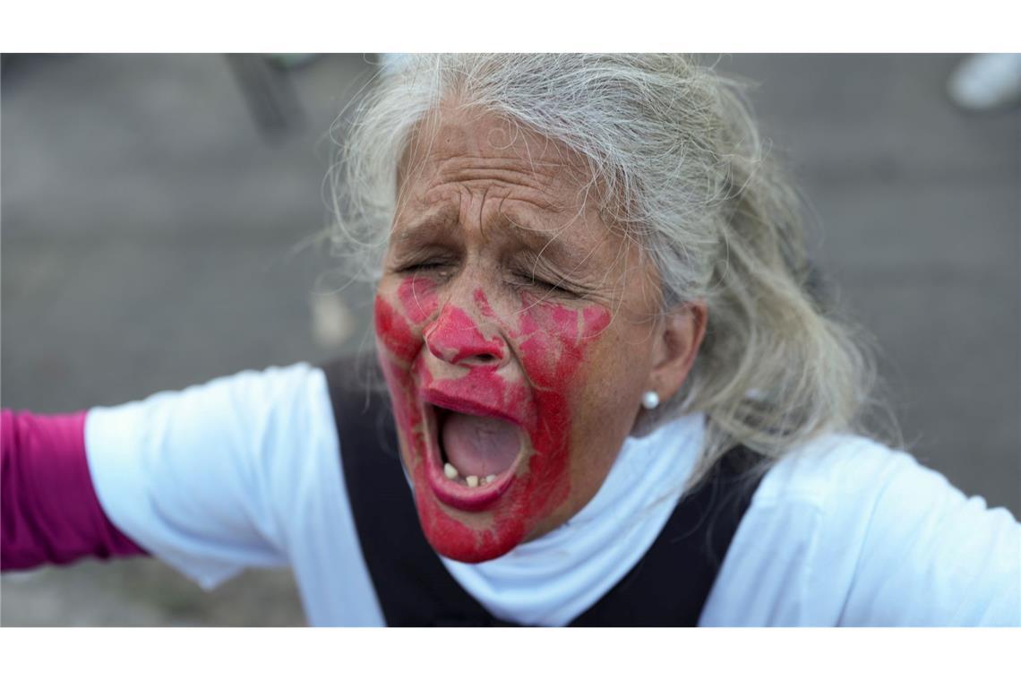 Bilder des Tages Eine Frau schreit während einer Mahnwache von Angehörigen von Inhaftierten, die die Freiheit von politischen Gefangenen in Venezuela fordern.