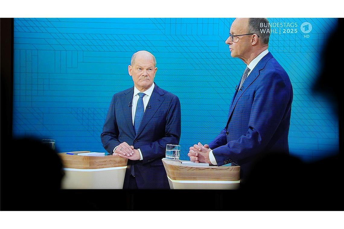 Hartes TV-Duell von Scholz und Merz zu AfD und Migration Heftige Wortgefechte: Olaf Scholz und Friedrich Merz im TV-Duell von ARD und ZDF.