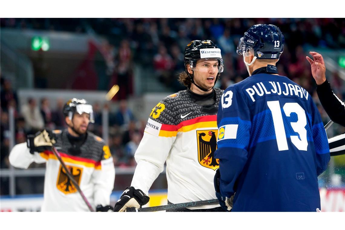 Kapitän Moritz Seider im Wortgefecht mit NHL-Kollege Jesse Puljujarvi.
