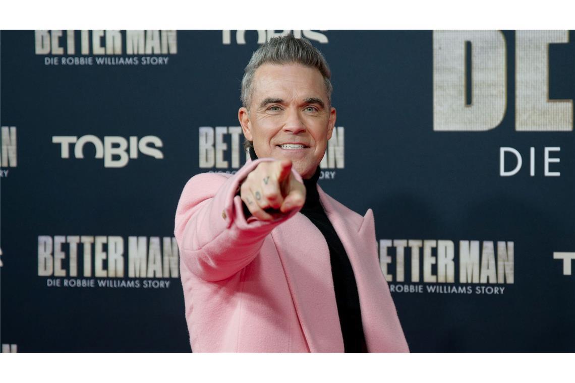 Wieso Konzerttickets immer teurer werden Kommt 2025 mit Konzerten nach Deutschland: Superstar Robbie Williams. (Archivbild)