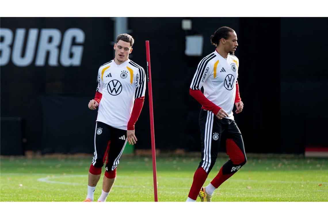 Leroy Sané (r) steht im Fokus.