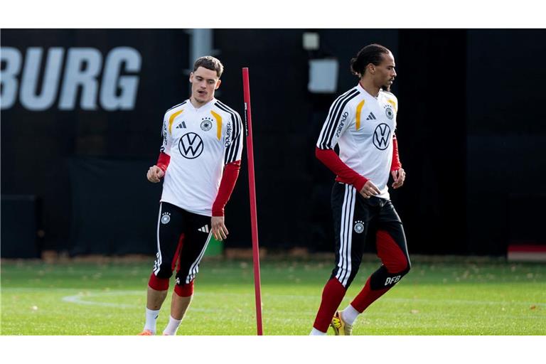 Leroy Sané (r) steht im Fokus.