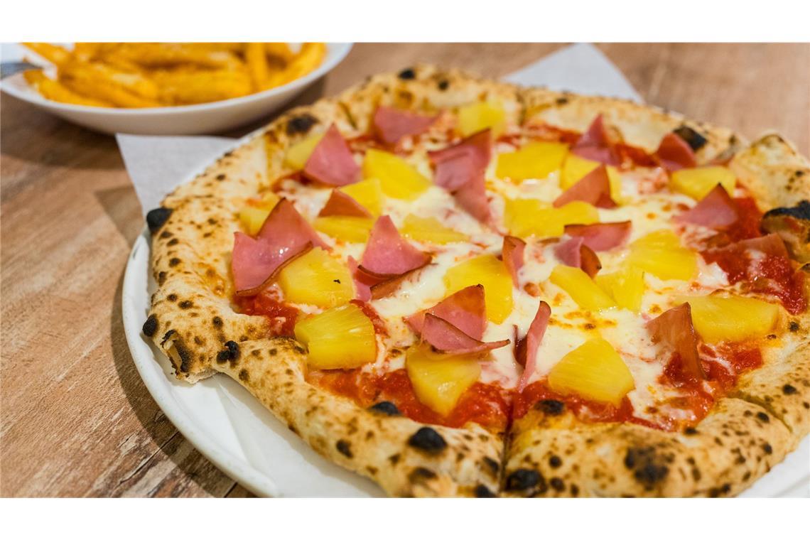 Gehört Ananas auf Pizza? Lieben Sie Tropical Hawaiian Pizza“? Oder dreht sich Ihnen schon bei dem Gedanken