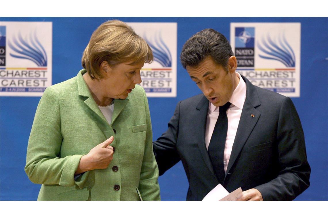 Merkel: "Klar, dass ich etwas Besonderes erlebte" NATO-Gipfel 2008 in Bukarest - Merkel mit Frankreichs Präsident Sarkozy. (Archivbild)