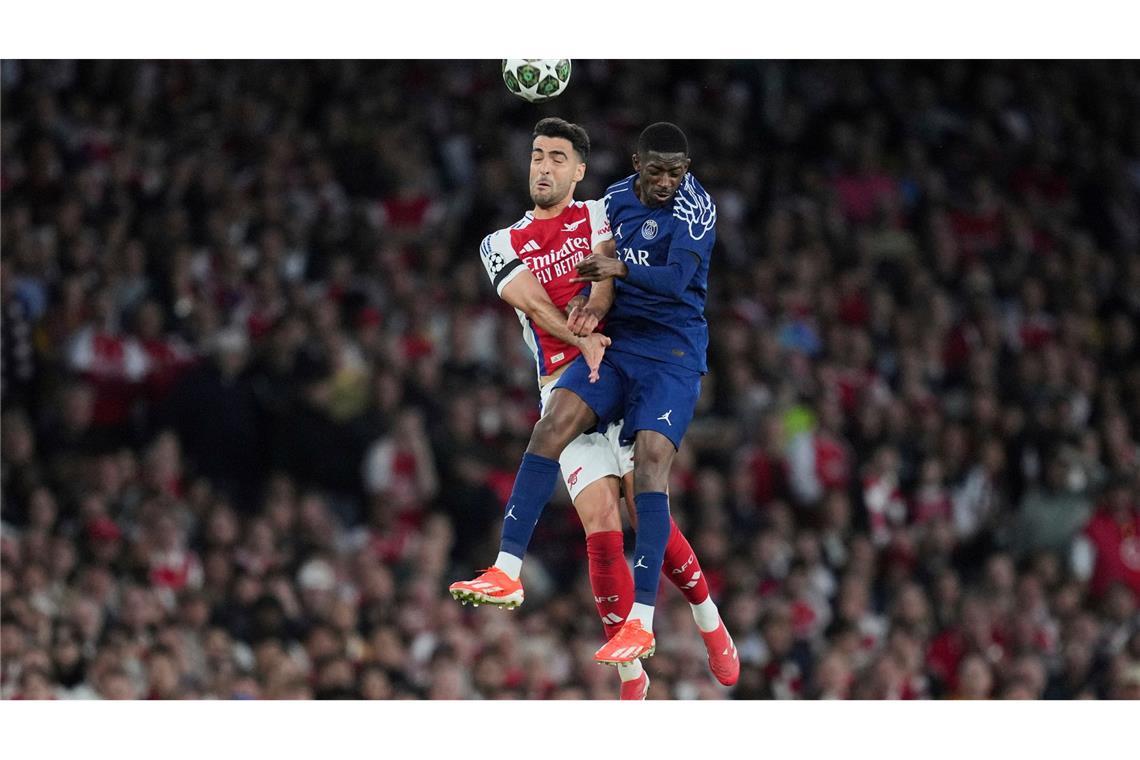 Paris "näher an den Sternen" - auch dank "Gigio III." Ousmane Dembélé (r) von Paris Saint-Germain hat sich in der Partie gegen den FC Arsenal leicht verletzt.