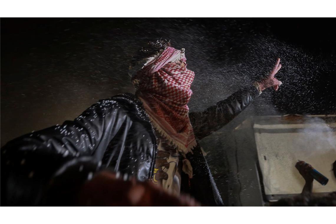 Bilder des Tages Palästinenser feiern die bevorstehende Ankündigung eines Waffenstillstandsabkommens zwischen der Hamas und Israel in Chan Junis im zentralen Gazastreifen.