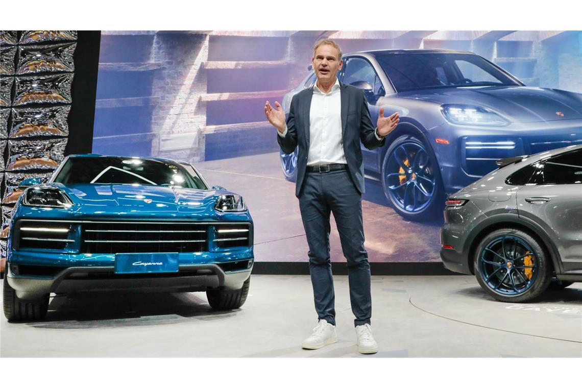 Porsche verkauft weniger Autos Porsche-Chef Oliver Blume neben dem global beliebtesten Modell seiner Kunden: dem Cayenne.