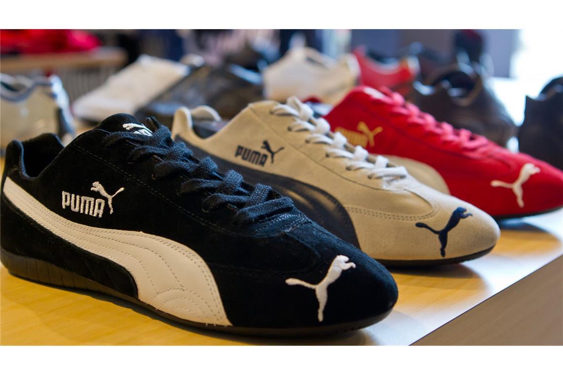 Gewinne bei Sportartikelhersteller gehen zurück Puma hinkt hinter seinem Lokalrivalen Adidas her.