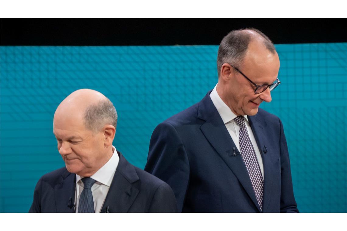 Hartes TV-Duell von Scholz und Merz zu AfD und Migration Scholz und Merz gehen nach Duell per Handschlag auseinander.