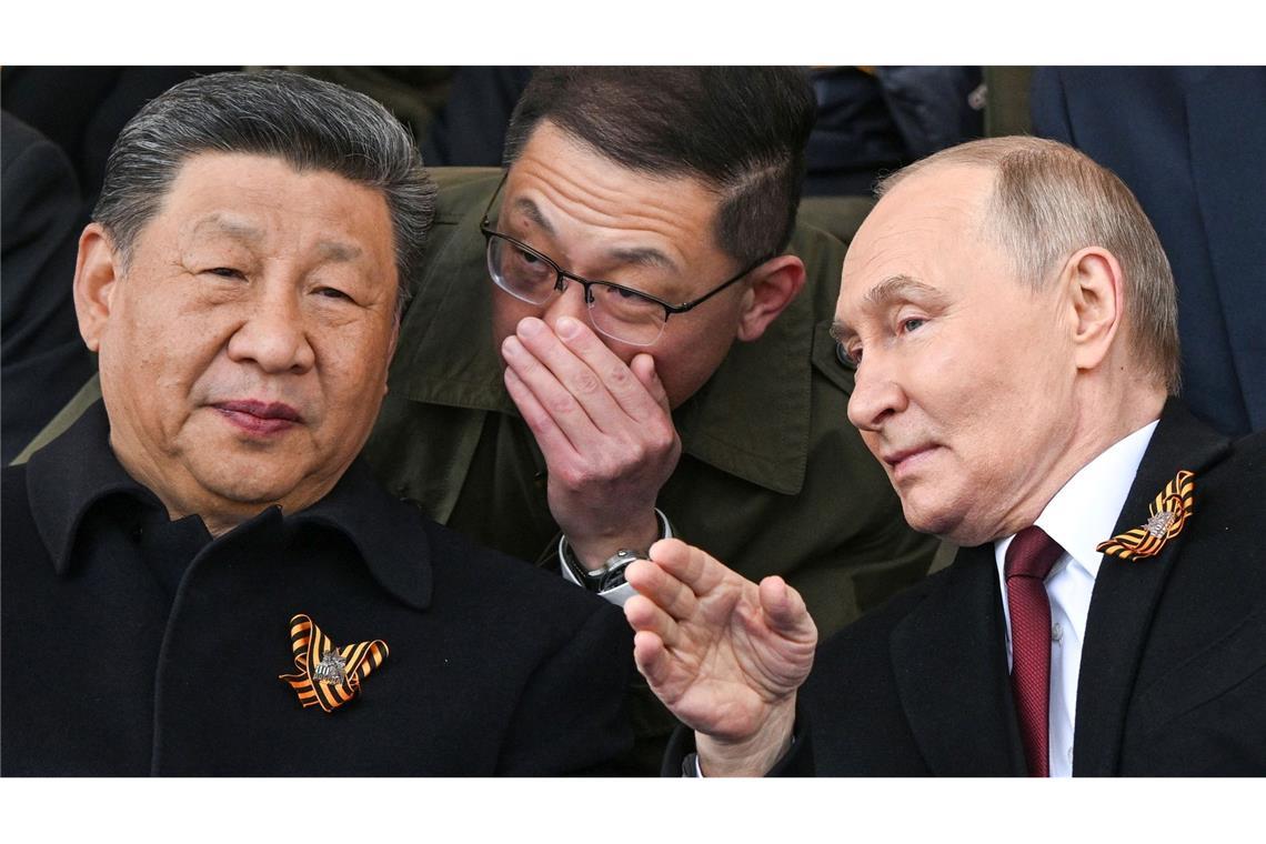 Bilder des Tages Tag des Sieges in Russland: Der russische Präsident Wladimir Putin (r) und der chinesische Präsident Xi Jinpin (l) unterhalten sich während der Militärparade zum Tag des Sieges, anlässlich der Feierlichkeiten zum 80. Jahrestag des Sieges der Sowjetunion über Nazi-Deutschland im Zweiten Weltkrieg.