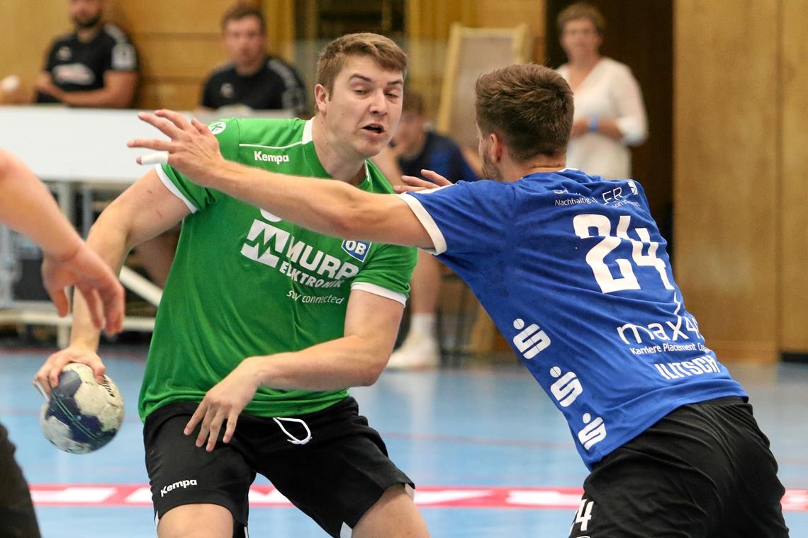Verletzungspech: HC Oppenweiler/Backnang fährt vorzeitig heim Timm Buck war im Duell mit Pfullingen mit fünf Toren der treffsicherste Werfer im grünen HCOB-Trikot. Foto: Alexander Hornauer