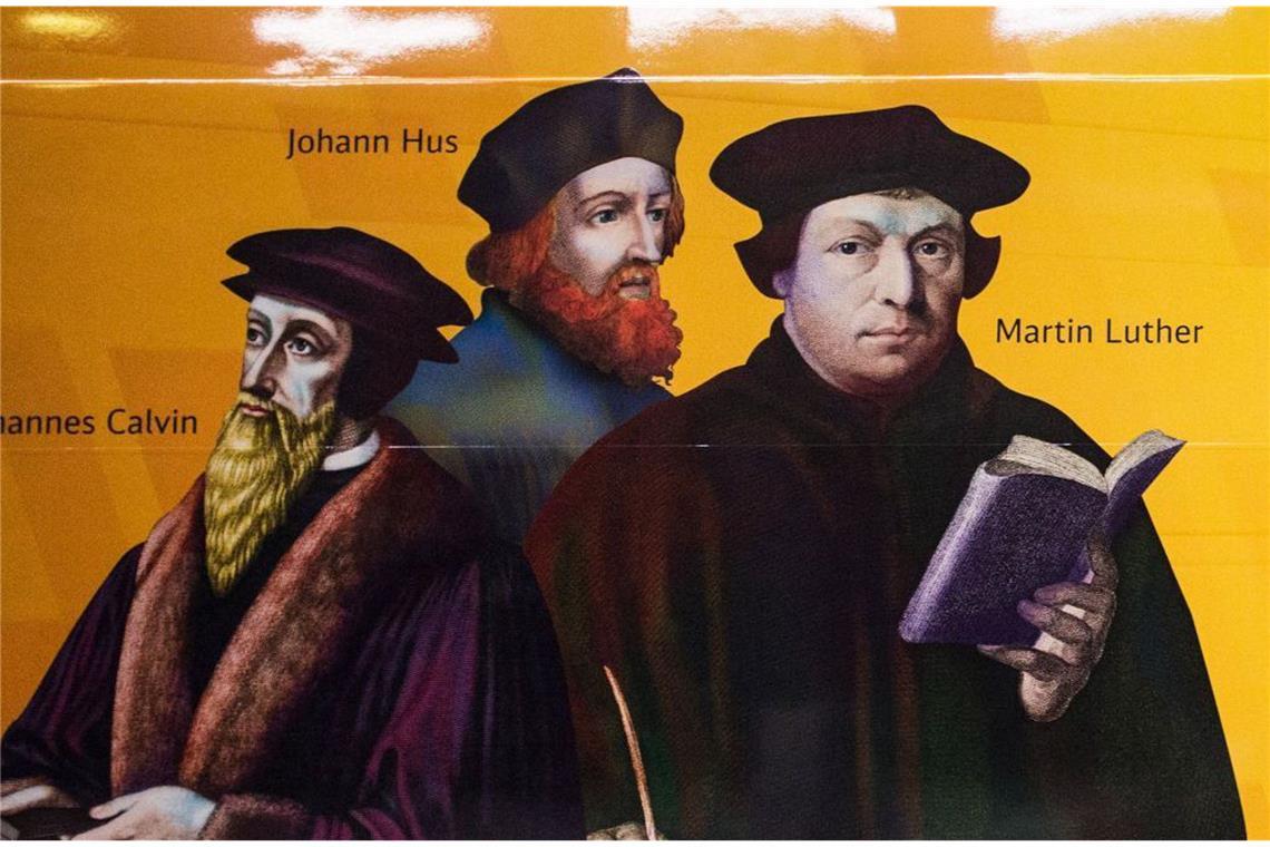 Welche christlichen Kirchen gibt es? Väter der Reformation: Johannes Calvin, Johannes Hus und Martin Luther.