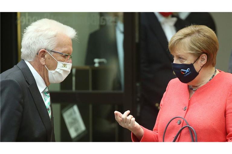 Winfried Kretschmann würdigt Angela Merkel (Archivbild).