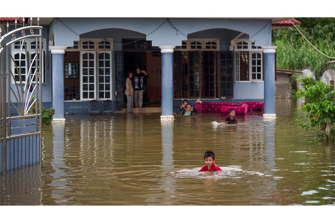 Dutzende Tote nach Extremregen in Malaysia und Thailand Zahlreiche Häuser standen unter Wasser.