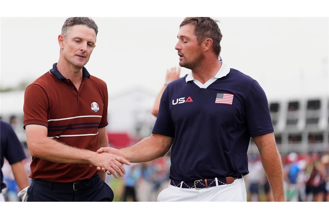 Europas Top-Golfer beim Ryder Cup vor Sieg in den USA Zwischen Justin Rose (links) und Bryson DeChambeau wurde es vor dem abschließenden Handschlag emotional.